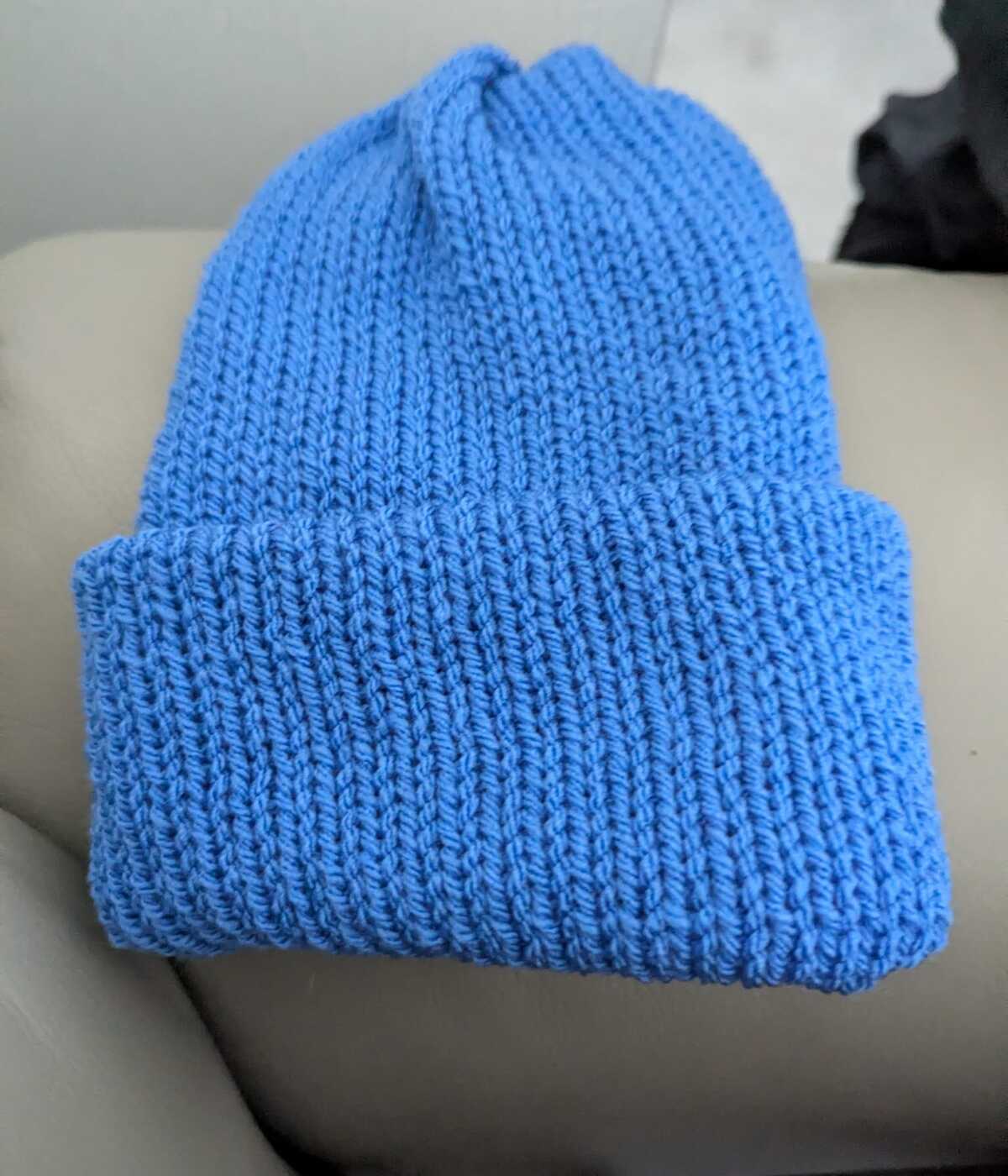 Jamie wearing one of his handmade beanies